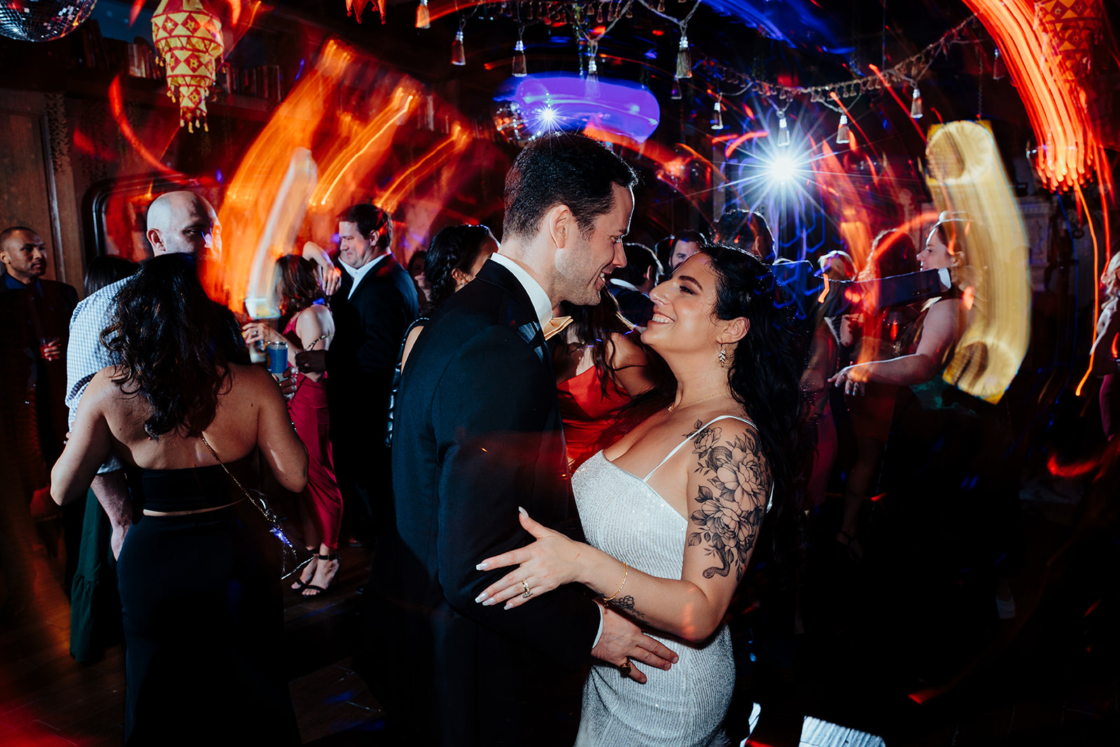 Bride and Groom Smiling Together During Wedding Celebration