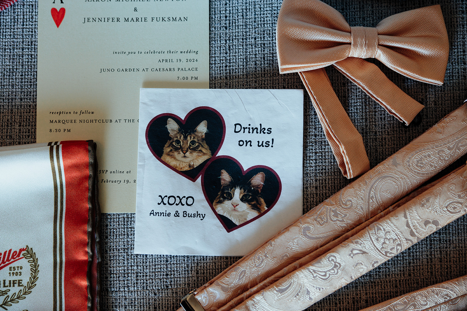 Wedding invitation details with custom cat illustration and accessories for a Las Vegas wedding.