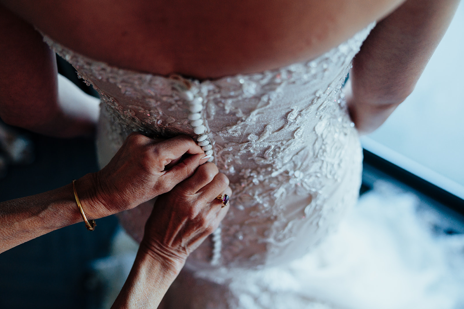 Close-up of a lace wedding dress with sparkling details for a Las Vegas wedding.