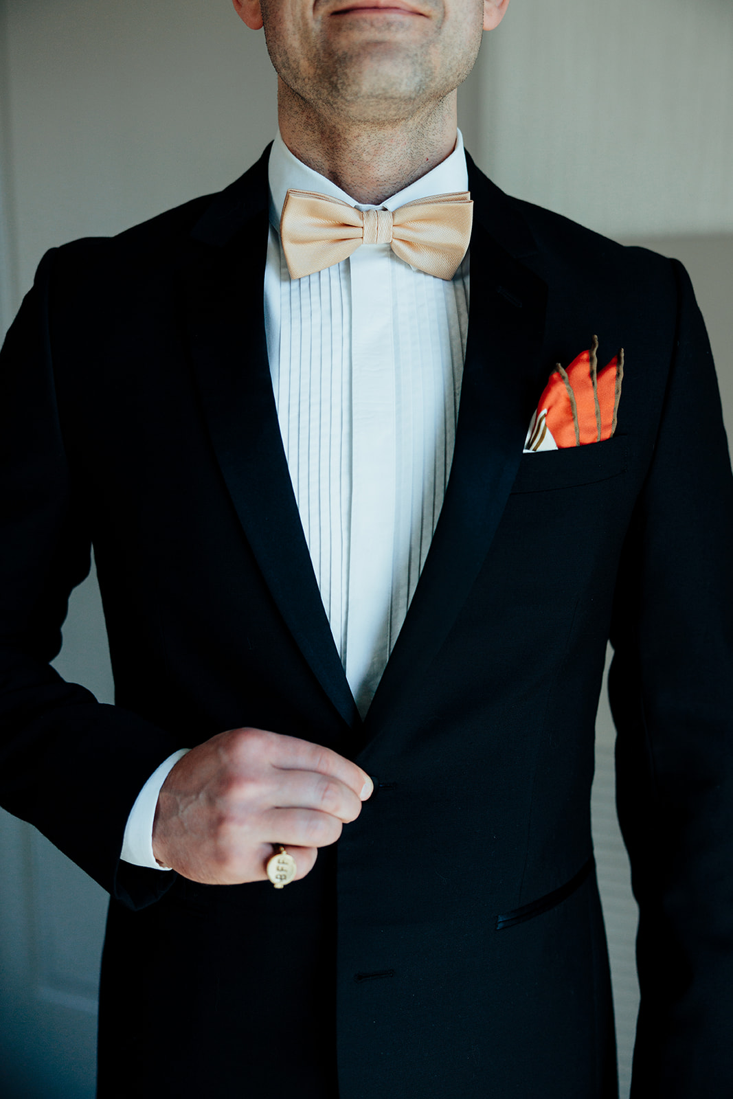 Close-up of groom’s tuxedo, bow tie, and pocket square in Las Vegas