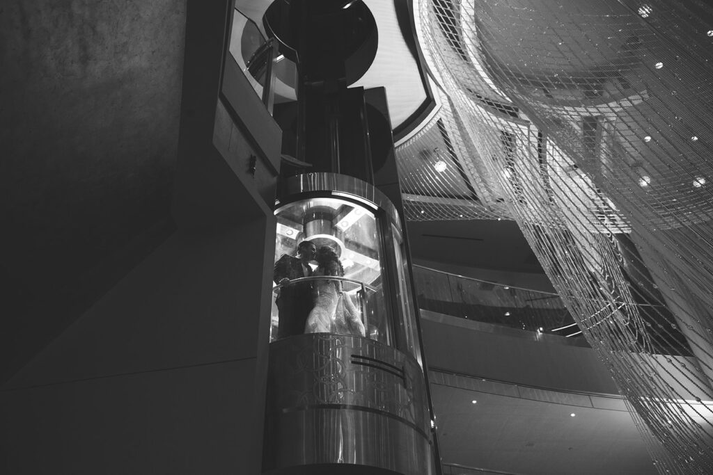 Bride and Groom Stuck in a Glass Elevator During Las Vegas Wedding