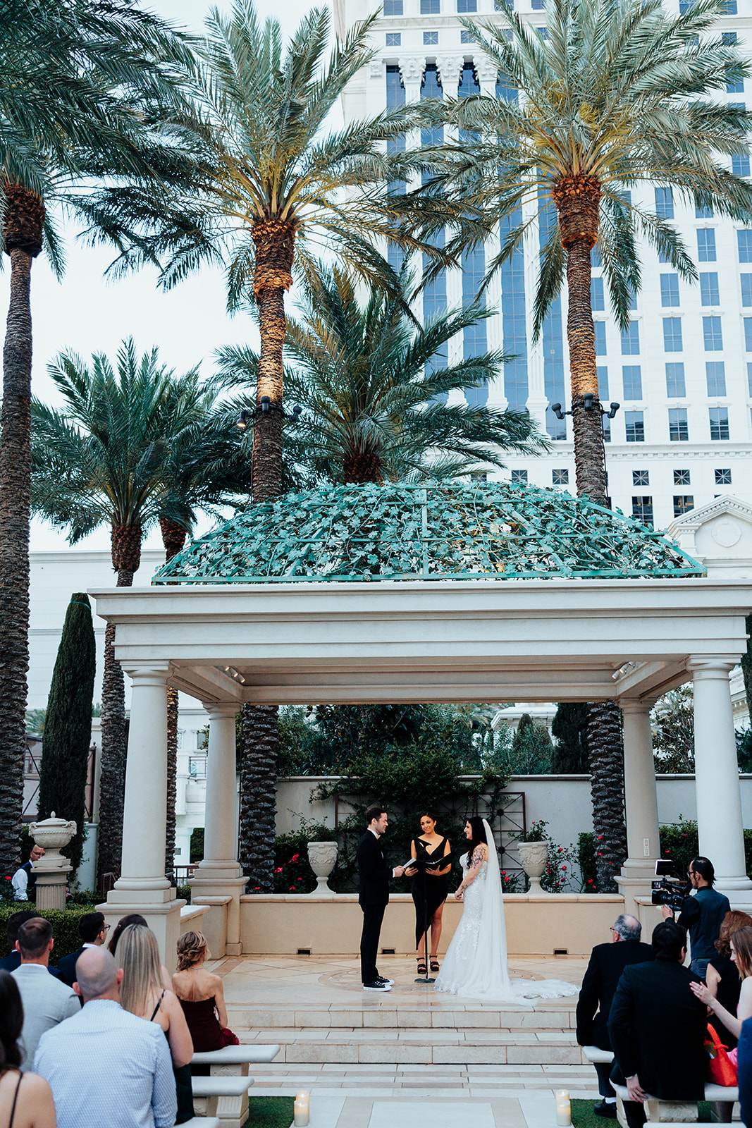 Outdoor Wedding Ceremony at Caesars Palace with Palm Trees