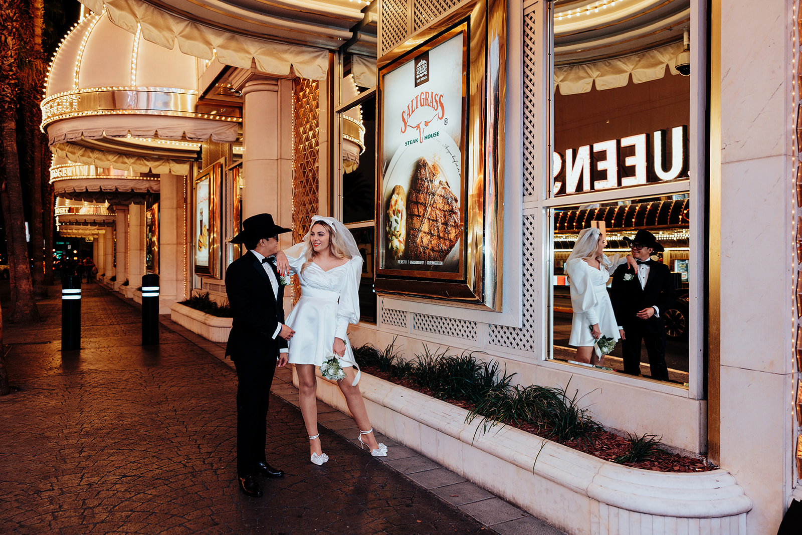 Bride and Groom Laughing Outside a Lit-Up Golden Nugget Vegas Casino