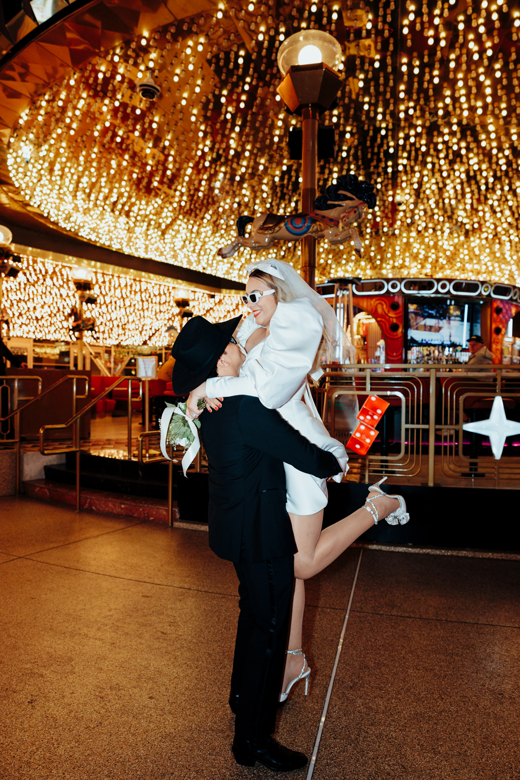 Joyful Newlyweds Celebrating Their Vegas Elopement at Night