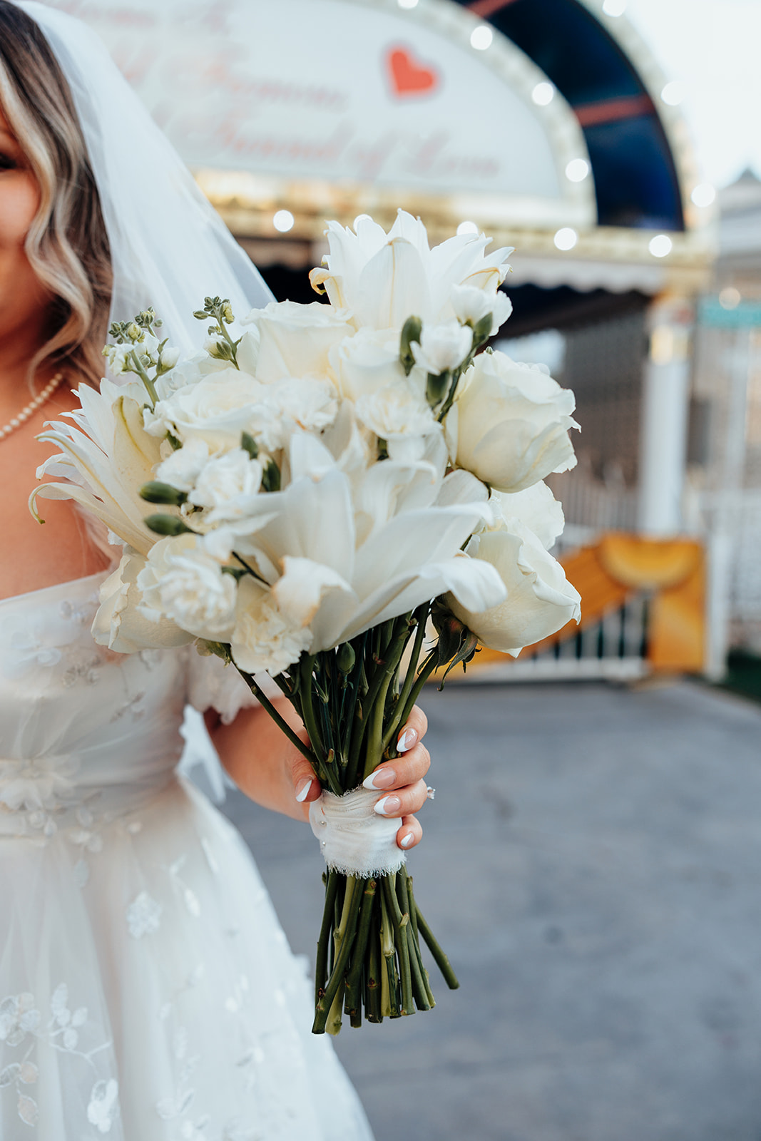 Close-up of custom floral bouquet from elopement kit for Little White Wedding Chapel elopement