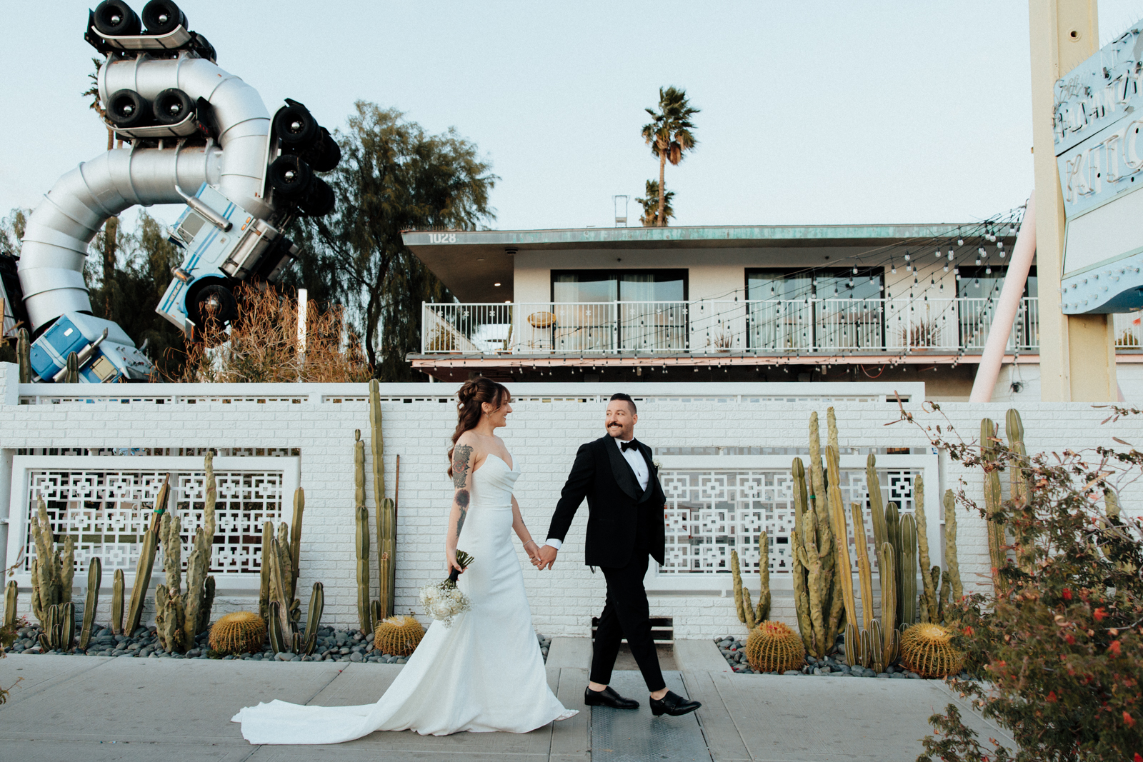 Wedding Couple Walking past Furguson's Motel Sign in Las Vegas