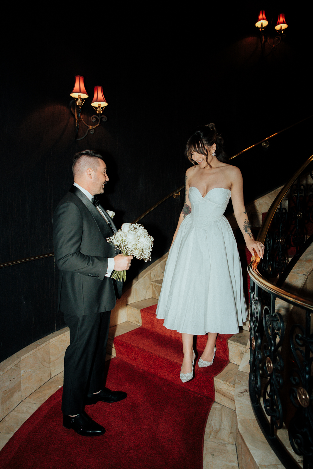 A couple descends the stairs in the El Cortez Hotel in Las Vegas.