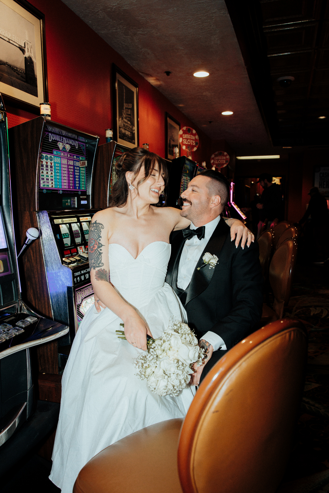 A Couple at the slots in the El Cortez Hotel.