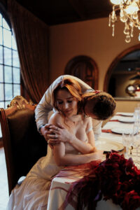 Couple sharing a loving moment at the dinner table