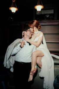 Couple on bar after wedding at Desert Inn Oasis